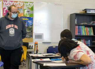students in classroom with teacher